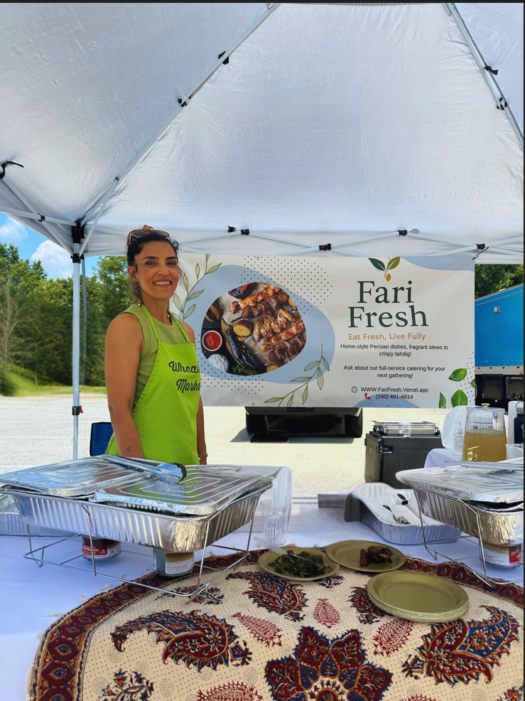 Fari at her farmers market booth